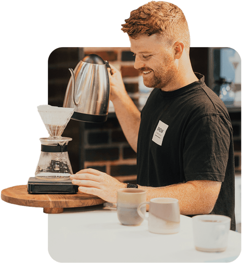 Brewing coffee with a smile at Brew