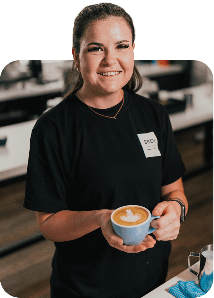 Brew Coffee Roasters talented team member serving up our delicious, award-winning Perth coffee beans.